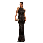 Woman wearing a black sequin dress on a white background