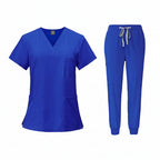 Blue medical uniform set with top and pants on a white background