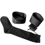 Black electric heating socks with straps on a white background