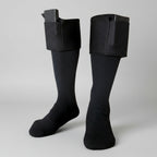 Black electric heating socks with flame effects and product details on a fiery background