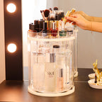 Clear makeup organizer with various cosmetic items on a vanity table.