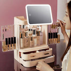 Makeup organizer with a mirror and various cosmetic products on a pink background