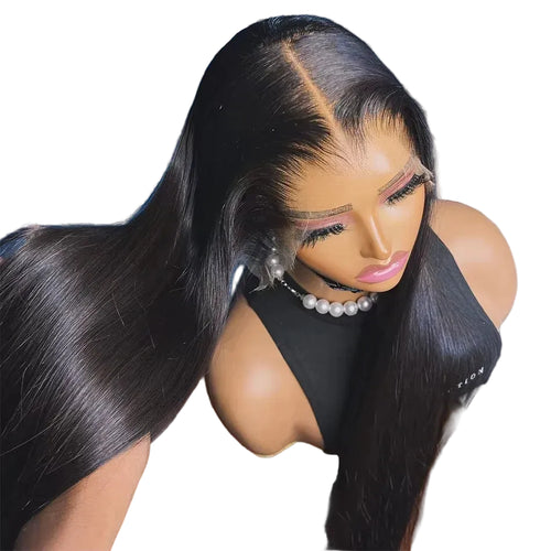 Mannequin head with long black hair styled in a sleek manner, wearing a black top and pearl necklace.