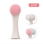 A pink silicone facial cleansing brush shown on a white background, with two circular inset views highlighting the bristle head and backing. A pink label in the top right reads 'pink'.