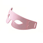 Pink eye mask for red light care with a woman wearing it on a white background