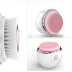 Two electronic cleansing brushes, one pink and one white, on a white background.