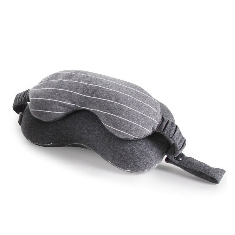 Gray sleep mask with striped design on a white background