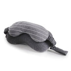 Gray sleep mask with striped design on a white background
