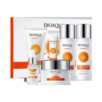 BIOAQUA skincare product set with bottles and cream on a white background
