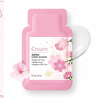 Cherry Blossom Cream packaging with pink floral design on a pink background