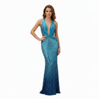 Blue sequin evening gown on a mannequin against a white background