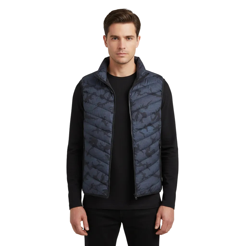 Black puffer vest on a white background