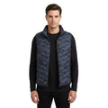 Black puffer vest on a white background