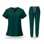 Green medical uniform set with top and pants on a white background