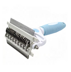 A pet grooming brush with a white plastic body, black metal teeth, and a light blue ribbed handle, shown on a plain white background.