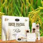 Rice facial skin care series with packaging and products on a wooden surface with rice plants in the background.
