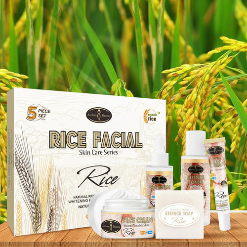 Rice facial skin care series with packaging and products on a wooden surface with rice plants in the background.