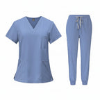 Medical uniform set with top and pants on a white background