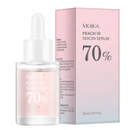 A pink glass dropper bottle of dark spot correcting serum featuring 10% niacinamide against a pink background.