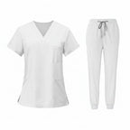 White medical uniform set with top and pants on a white background