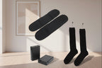 Black knee-high socks with measurements on a white background