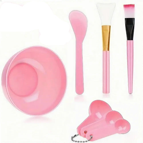 7-piece skincare tool kit with pink and white items on a white background