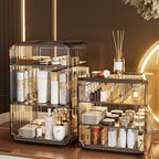 Cosmetic display case with various skincare products on a wooden surface.