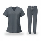 Gray medical uniform set with top and pants on a white background