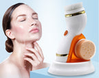 Woman using a facial cleansing brush with a blue background