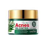 Acnes Oil Control face cream jar with gold lid on a wooden surface, greenery in the background
