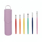 Purple travel set with toothbrushes and case on a white background