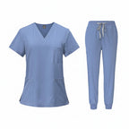 Medical uniform set with top and pants on a white background