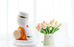 Beauty device with a vase of tulips on a white background