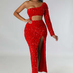 Red sequin dress with long sleeves on a plain background