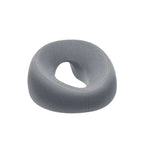 Gray donut pillow with measurements on a white background