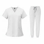 White medical uniform set with top and pants on a white background