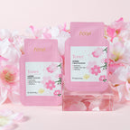 Feny! toner packets with cherry blossom design on a pink floral background