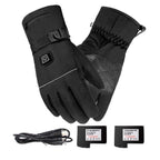 Black heated gloves with battery pack and USB cable on a white background
