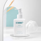 White skincare bottle with pump on a light gray background