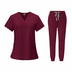 Maroon medical uniform set with top and pants on a white background