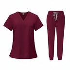 Maroon medical uniform set with top and pants on a white background
