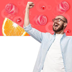 Man with raised fist and pomegranate citrus gummies on a red background