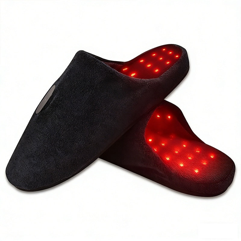 Black slippers with red LED lights on a white background