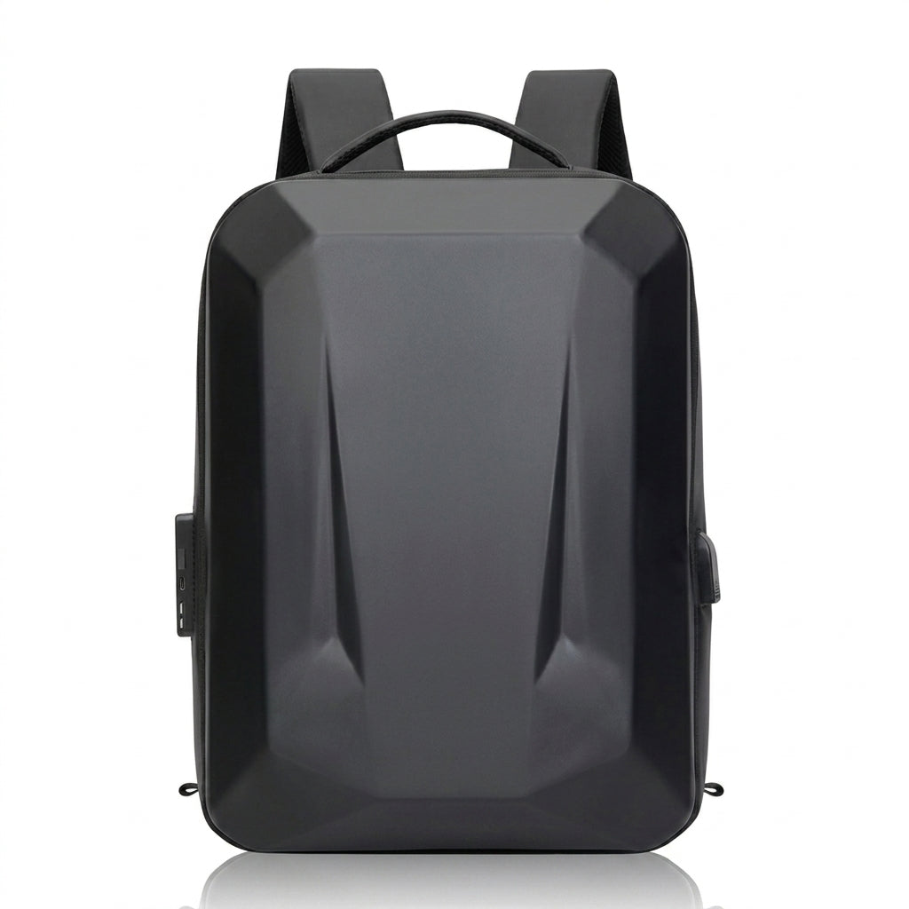 A matte black backpack with a geometric, faceted design, shown from the front on a white background with a subtle reflection.