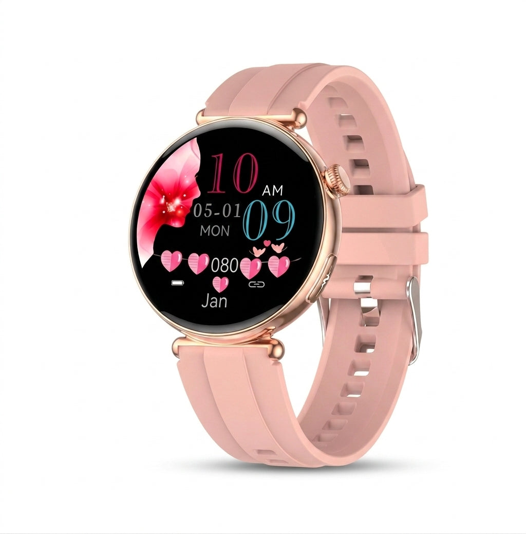 A round smartwatch with a light pink silicone strap and a rose gold-toned case, shown on a clean white background. The watch face is active with a digital display showing the time as 10 AM, a pink flower graphic, and various heart icons.