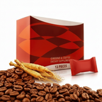 A box of Hamer Ginseng & Coffee dietary supplement, shown with two raw ginseng roots, scattered coffee beans, and a single red packet in front of a clean white background.