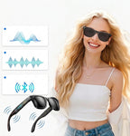 A woman wearing black sunglasses is shown against a bright white background, with feature callouts and a second pair of sunglasses displayed beside her. The graphics suggest voice control and Bluetooth connectivity.