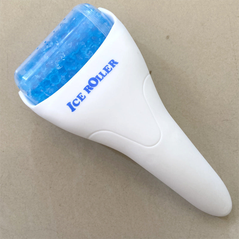 White ice roller with blue roller on a beige background