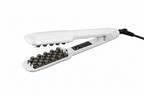 Two flat hair straighteners shown on a plain white background: one black and one white, both with metallic plates and a cord visible on the right.