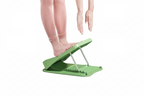 Green foot stretcher with labeled parts on a light green background